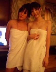 Korean chicks posing naked in a hotel room