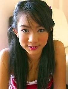 Dolla has the skills that will keep your attention. She models a red top and she enjoys smiling for the camera.