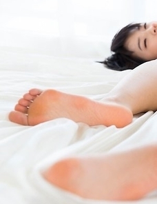 Teenage tomboy Ai Mukai takes off her bikini to masturbate and show feet