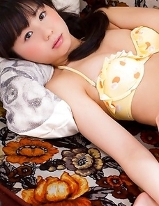 Rina Koike in colorful lingerie loves her dog pillows