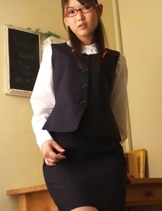 Noriko Kijima with specs and office suit is elegant and hot