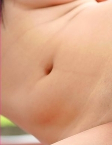 View the sexy Angel Paroon as she pulls down her top and lets her tits out. She has a colourful necklace that accentuates her fantastic nipples.