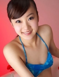 Kana Yuuki in fishnets has fine curves in blue bath suit
