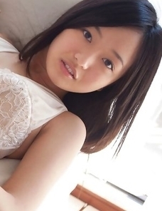 Mayumi Yamanaka with big hooters smiles and is very playful