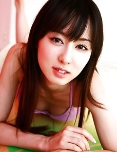Rina Akiyama with sexy legs looks hot in mauve bath suit