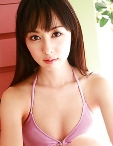 Rina Akiyama with sexy legs looks hot in mauve bath suit