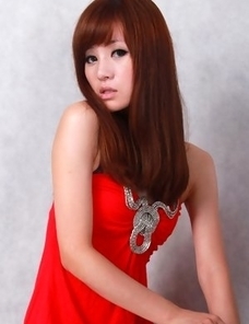 Sandy on heels shows hot behind in red dress for pictures