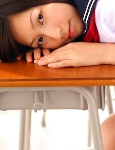Kaori Ishii is naughty and shows legs under uniform skirt