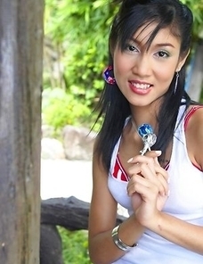 Hot Yoko Hasegawa is licking her pink lollipop and just pretending like it is a cock. She licks it so good that you penis will definitely get hard aft
