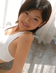 Noriko Kijima with huge knockers loves sun on her skin