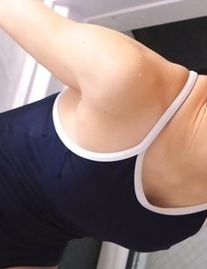 Yuri Hamada washes and showers her hot body over bath suit