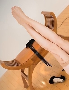 Heels-wearing hottie Aya Kisaki posing in a strict office-type outfit on cam