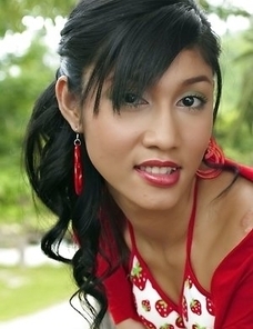 Hot asian brunette Yoko Hasegawa pushing pussy outdoors