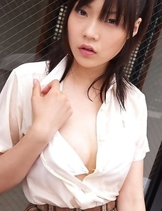 Airi Sakuragi unbottoms shirt and shows chest in white bra