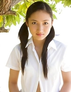 Adorable little asian chick Saaya Irie hanging out at the beach in a bikini