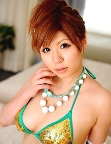 Cute Japanese babe poses outdoor