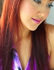 Iko Yeung begins getting on the freaky side as she drops her top. She lets her nipple peak out and it is dark and hard.