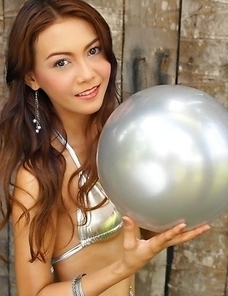 Vicky Pareemon has on a hot silver Bikini that rests against her gorgeous ass. She has a remarkable pussy that is covered by her panties.