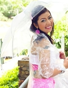 It has been a really rainy day, but stunning Kathryn Kaweesam truly didn't care much about it.