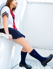 Runa Hamakawa plays with her uniform skirt after classes