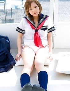 Runa Hamakawa plays with her uniform skirt after classes