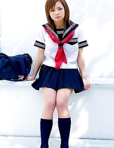 Runa Hamakawa plays with her uniform skirt after classes